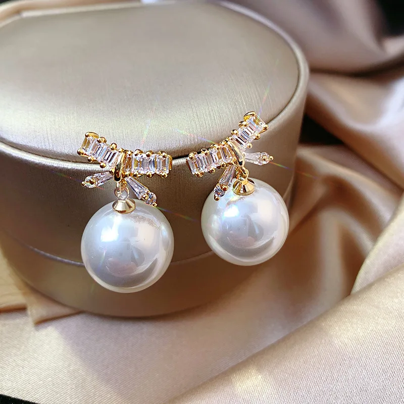 Penelope Bow Pearl Earrings